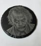 The Joker on a slate coaster 