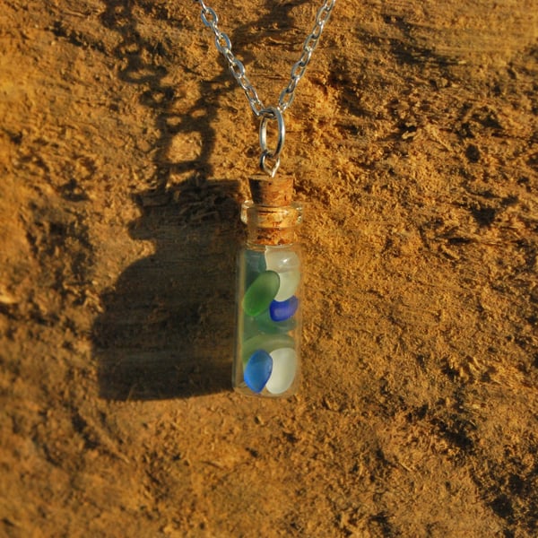 Mini bottle pendant with tiny beach glass pieces