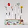 Button and Clay Flower Garden in a Floral Block 'Be a wild flower'