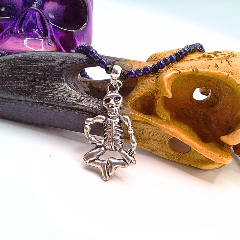 Dancing Skeleton Pendant on a Black and Purple Necklace, Halloween Jewellery