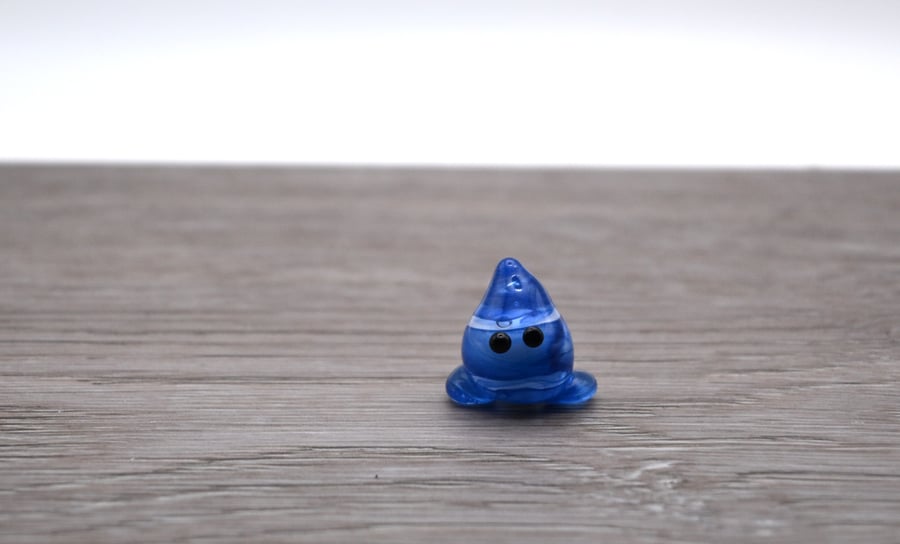 small glass wisp keepsake figure