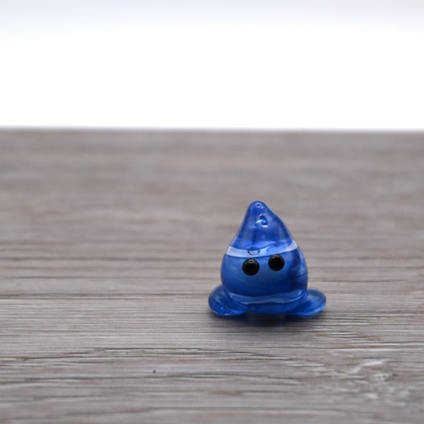 small glass wisp keepsake figure