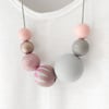 Zoe - Subtle pinks and greys with a touch of muted gold