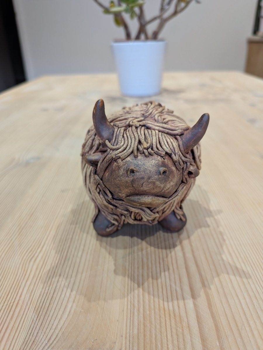 Handmade ceramic highland cow sculpture 