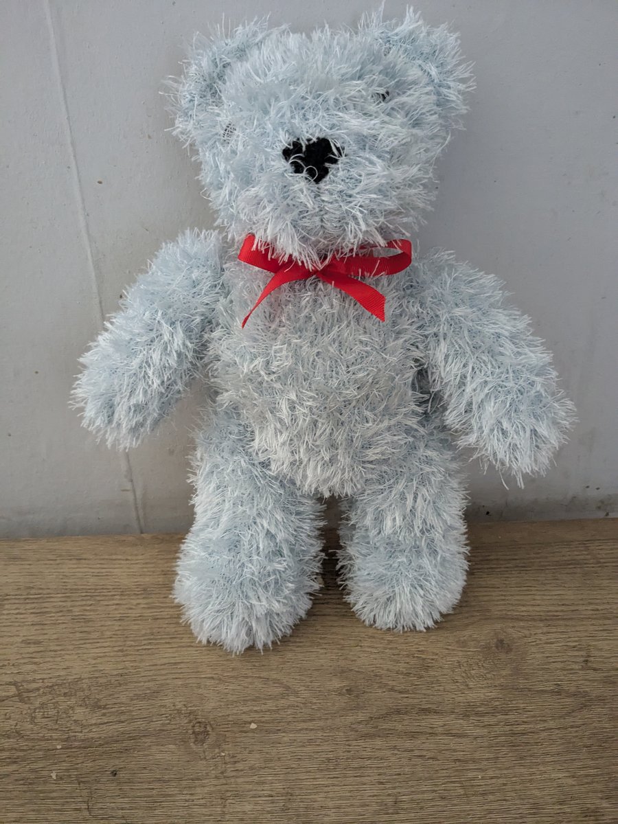 Hand knitted teddy bear 