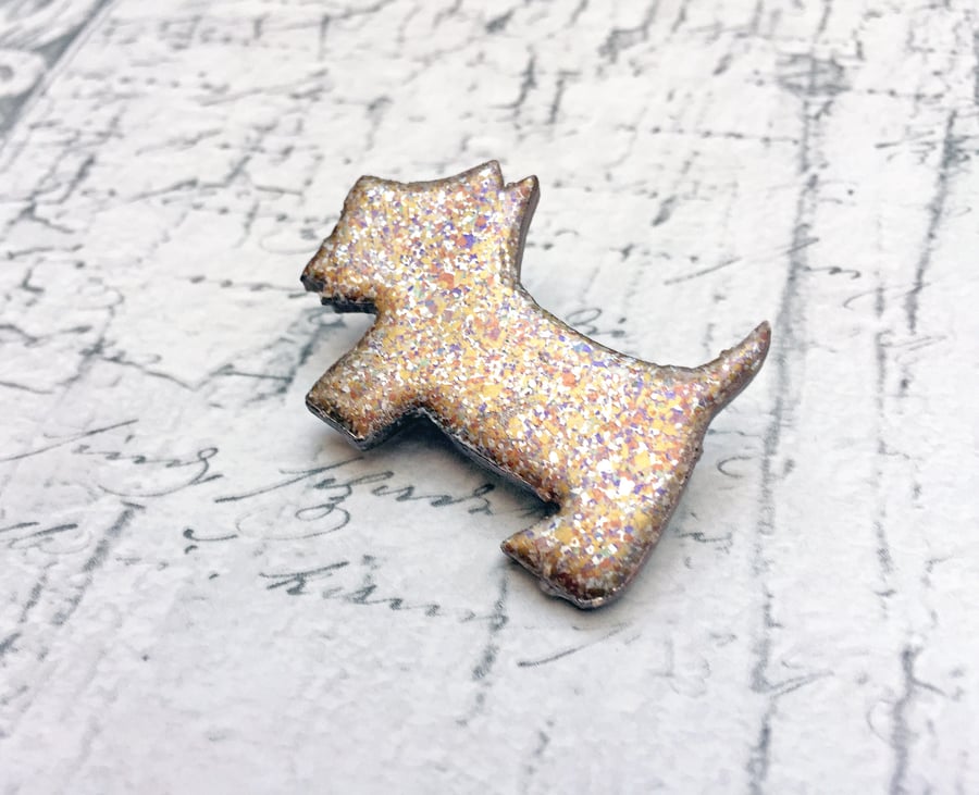 Scotty Dog Brooch with pale silver, gold and pale copper marbled jewel enamel