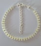 Pale Yellow Frosted Glass Rondelle Bead Bracelet - Image 1