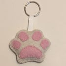 Handmade sewn felt dog pawprint cream keyring