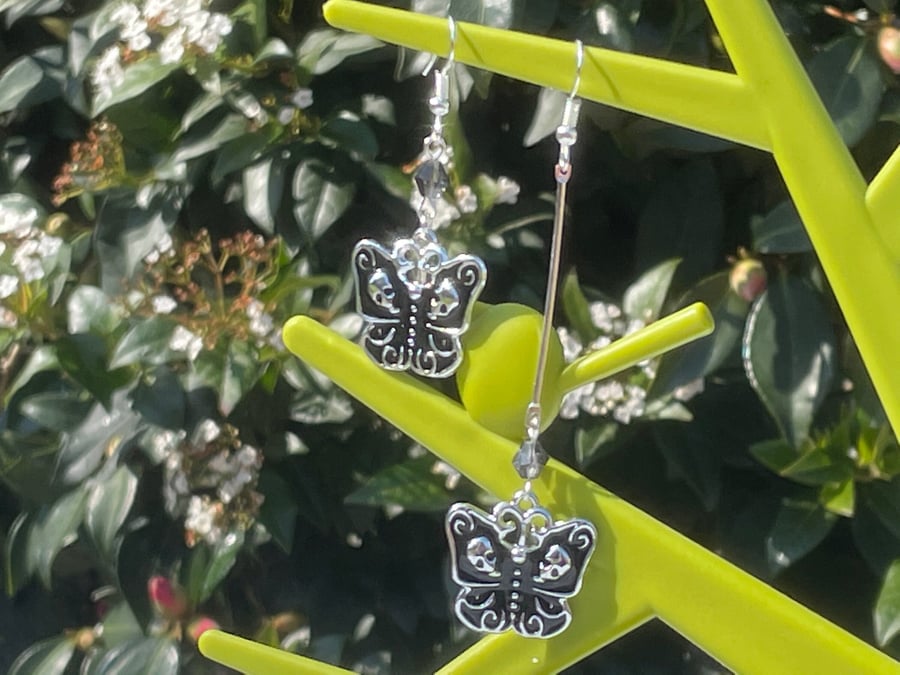 MISMATCHED MOTH EARRINGS skull crystal black silver drop cool punk 