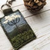 Up cycled embroidered cow parsley keyring or bag charm.