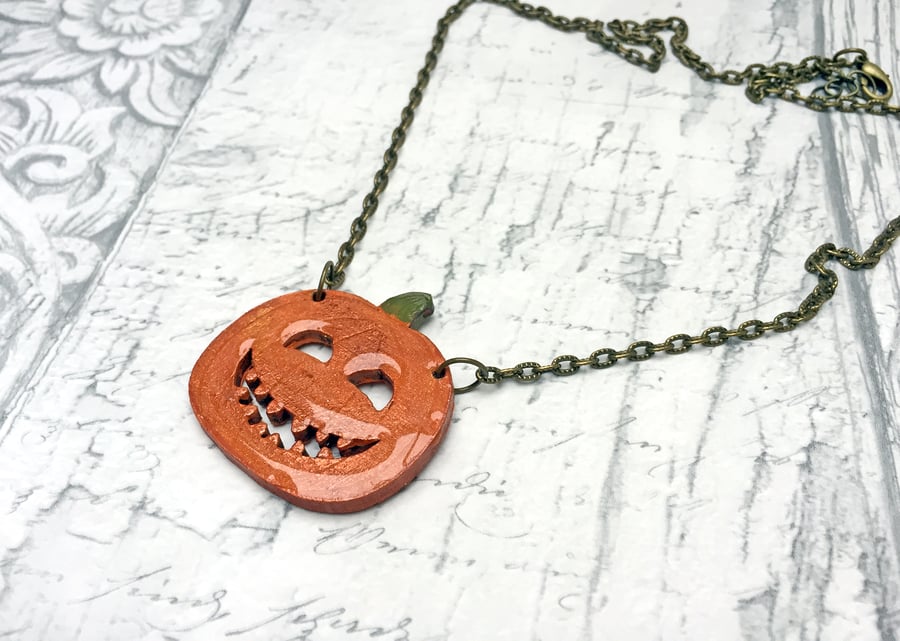 Orange wooden Halloween Pumpkin or Jack-o-Lantern pendant