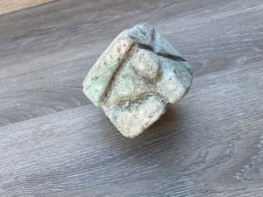 Ancient cube artifact with unidentified  makings