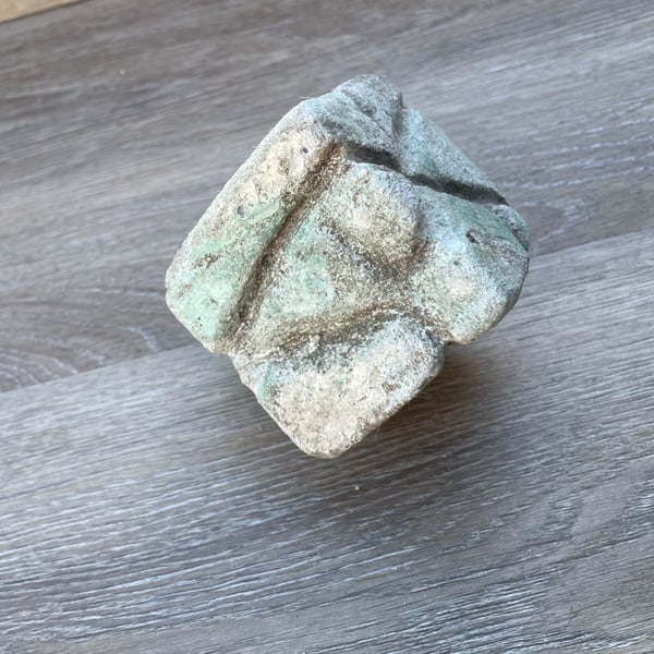 Ancient cube artifact with unidentified  makings