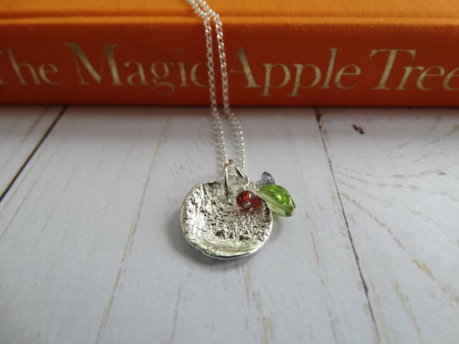 Textured recycled silver disc pendant with gemstone cluster