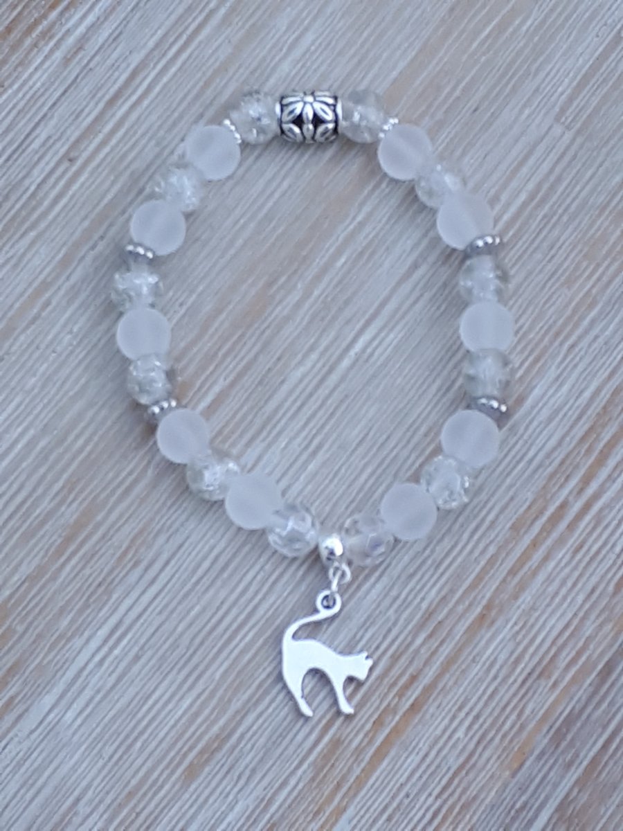 White bracelet with cat charm, selling in aid of MK Cat Rescue