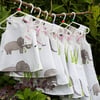 Age: 6-12m. White and grey elephant cotton dress. 