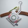 Lavender bag, with circular vintage floral embroidery.