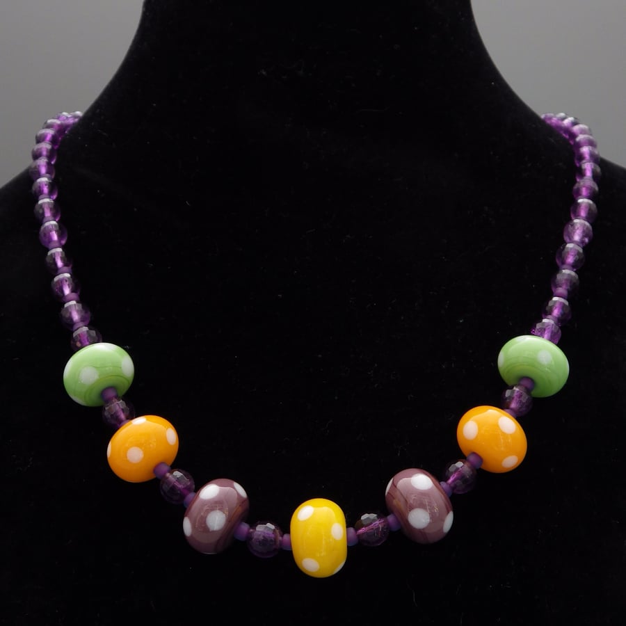 Spotty lampwork glass bead necklace with faceted amethyst semiprecious beads