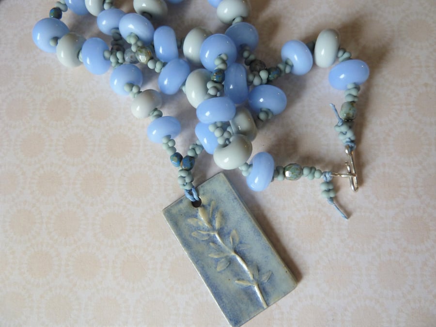 blue and grey glass and ceramic necklace