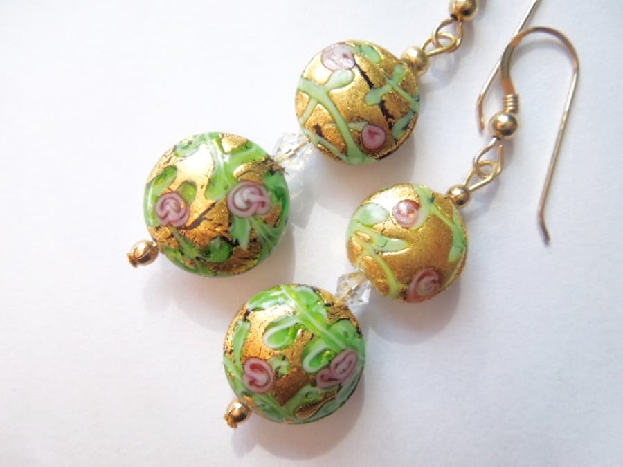 Gold decorated Murano glass earrings with Swarovski.