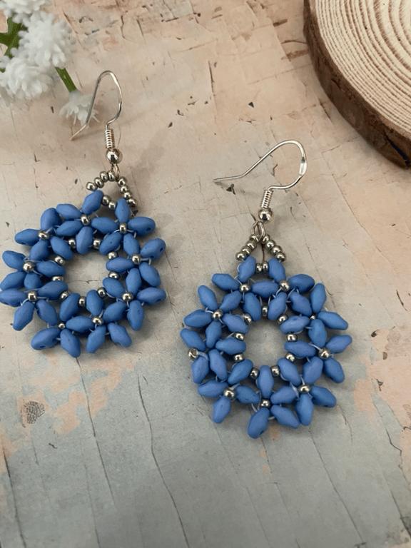 Beautiful hand woven beaded blue daisy hoop earrings 