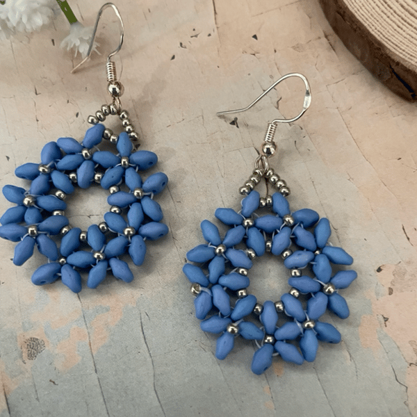 Beautiful hand woven beaded blue daisy hoop earrings 