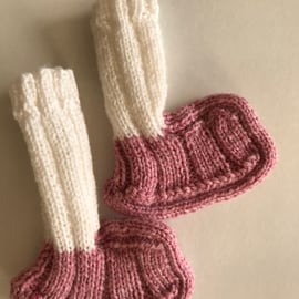 Pink and white hand knitted baby bootees