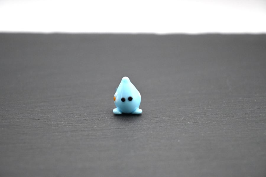small glass blue fairy imp figure