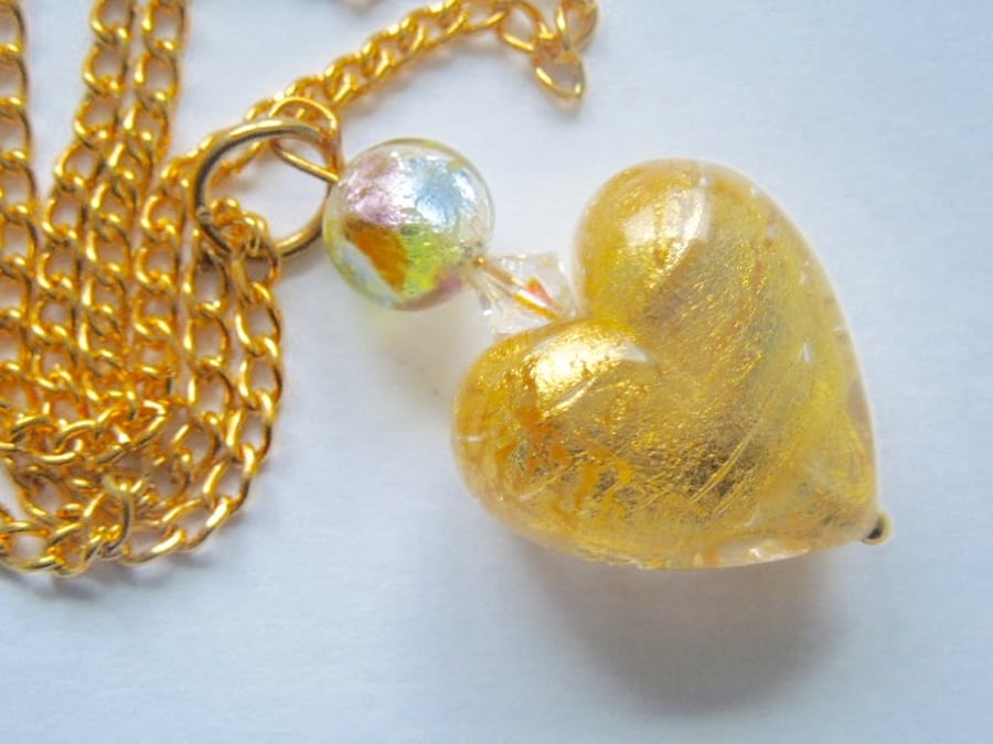 Murano glass gold heart pendant with Swarovski crystal.