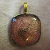 Handmade dichroic glass cabochon pendant - salmon with gold dragonfly