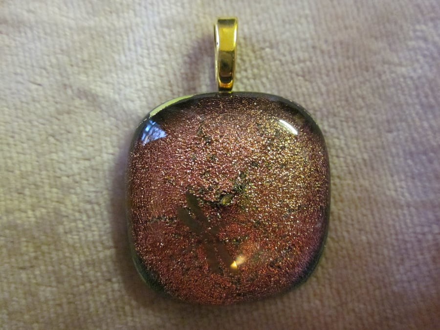 Handmade dichroic glass cabochon pendant - salmon with gold dragonfly