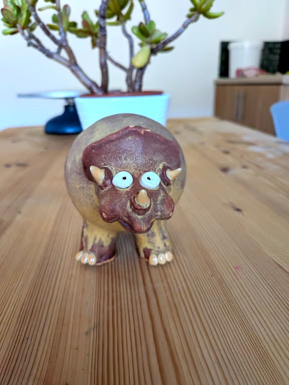 Ceramic triceratops, dinosaur ornament