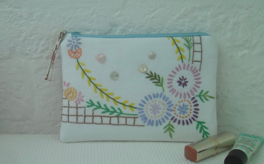 Zipped make up bag using upcycled embroidery