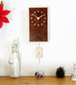 Rectangular Pendulum Wall Clock in burr madrone and sycamore with inlaid squares - Image 1