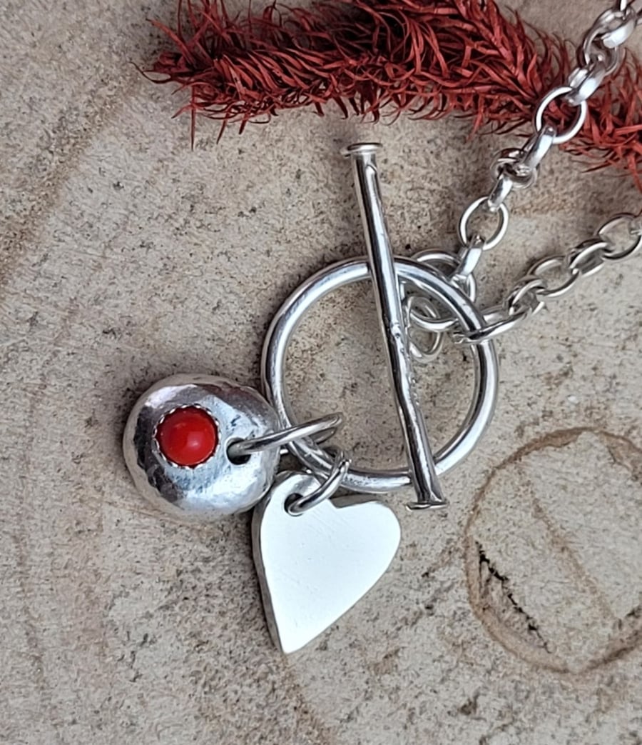 BANGLE WITH PEBBLE AND HEART CHARM