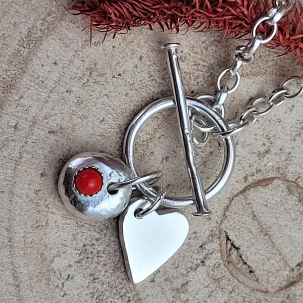 BANGLE WITH PEBBLE AND HEART CHARM