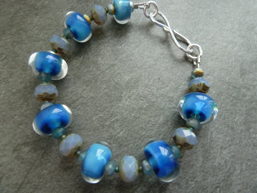 handmade blue lampwork glass bracelet, sterling silver
