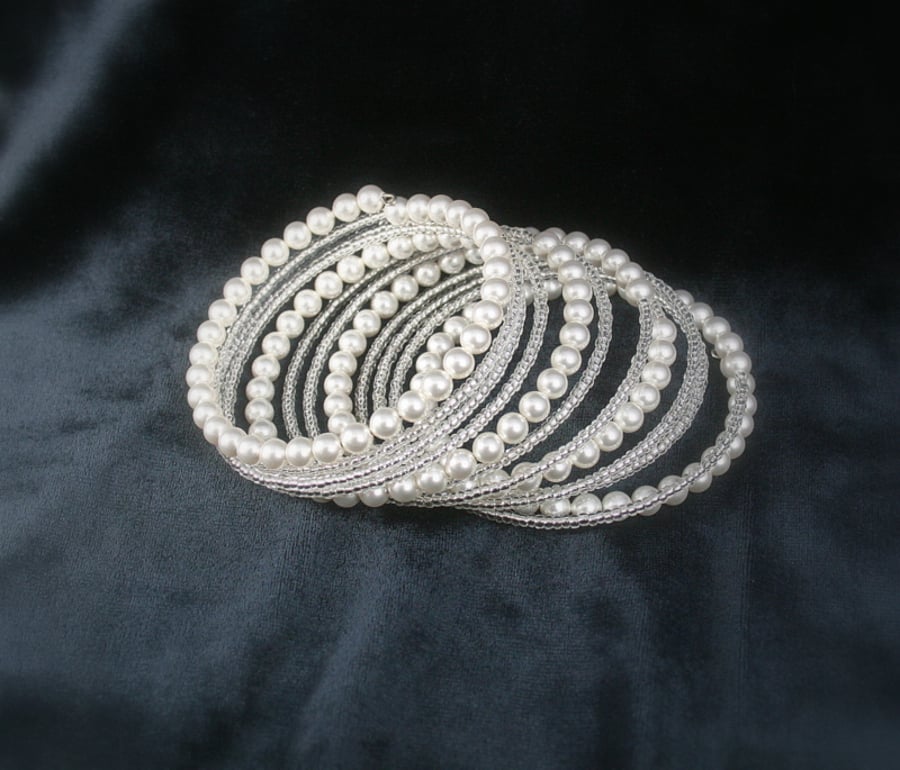 Swarovski Pearl and seed bead memory wire bracelet.