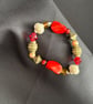Handmade bracelet. 16cm. Beautiful red, gold & yellow colours. 
