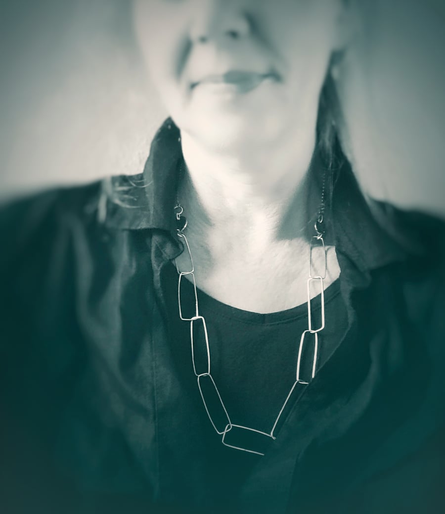 Unusual contemporary sterling silver long chain necklace 