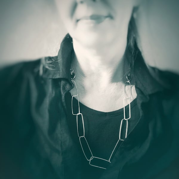 Unusual contemporary sterling silver long chain necklace 