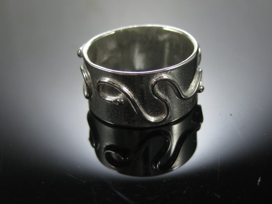 Silver scrolled ring