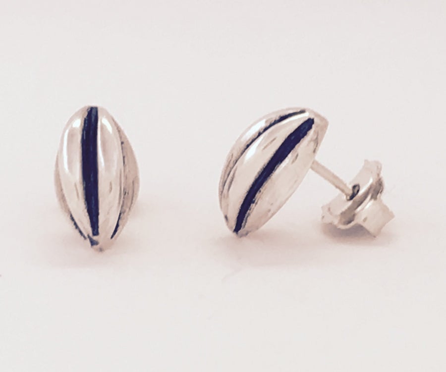 Silver coffee bean shaped stud earrings