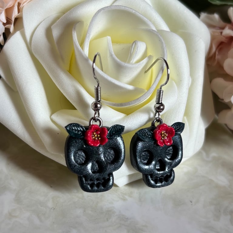 Black floral skull earrings