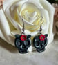 Black floral skull earrings