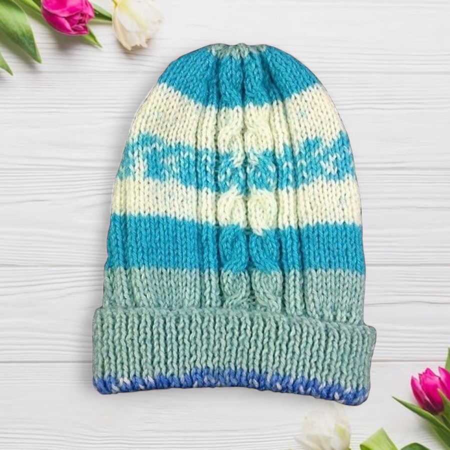 Baby blue and cream hat hand knitted with cable design 3 months
