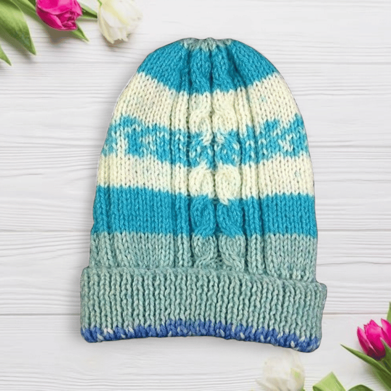 Baby blue and cream hat hand knitted with cable design 3 months