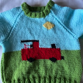 Fun hand knitted toddlers train jumper