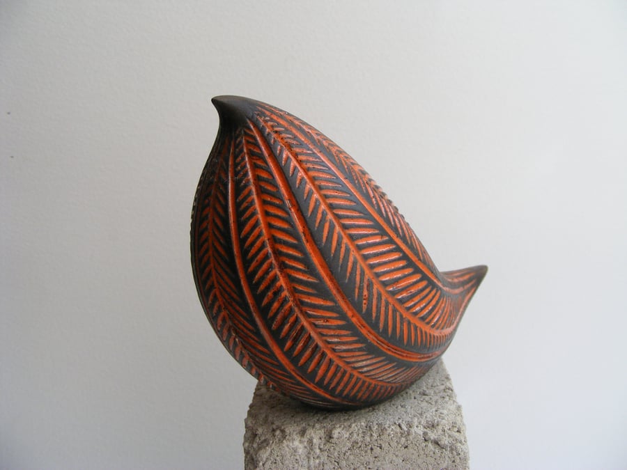 Orange carved raku bird (D2)