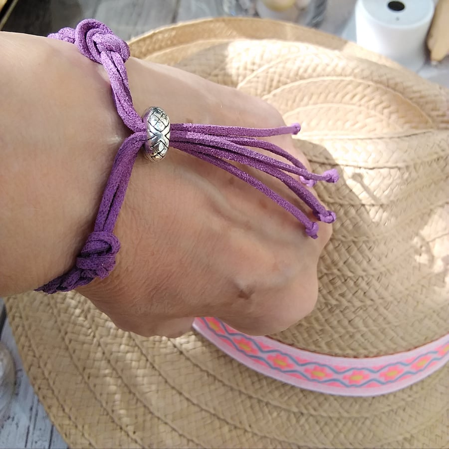 Faux Suede purple Braided Bracelet with Silver plated bead.
